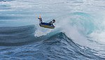 Bodyboarder at Playa Confital doing an air reverse exit