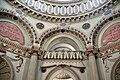 Inside domed hall with decorative bilingual inscriptions in Arabic and German