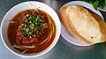 Bò kho served with bánh mì