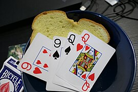 Bread in bowl with playing cards with box outside.jpg