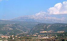 Picture of large mountain with about 30-degree sloped sides