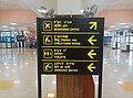 A trilingual signboard in the airport displaying in Meitei (officially called Manipuri), Hindi and English