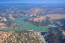 Aerial view of dam and lake