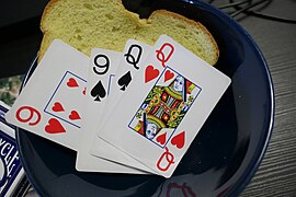 Bread in bowl with playing cards with a little of the top cut off.jpg