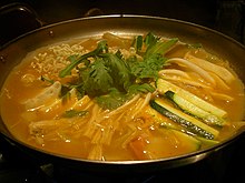 A spicy stew in a pot