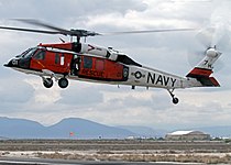 A U.S. Navy Sikorsky MH-60S Sea Hawk helicopter (BuNo 165769) attached to the "Longhorns"