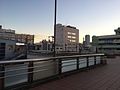 The elevated entrance and pedestrian walkway connecting with JR Higashi-Kanagawa station in January 2015