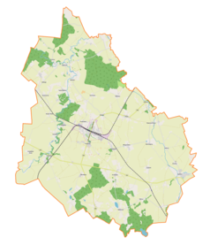 Mapa konturowa gminy Korsze, blisko centrum na prawo znajduje się punkt z opisem „Pomnik”