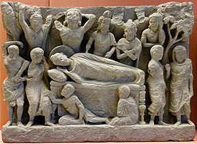 Sculpture en pierre de Gandhara, Pakistan, figurant la mort de Bouddha, Ier au IIIe siècle.