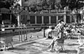 Bathers on the terrace of the hotel's outdoor wave pool, 1939