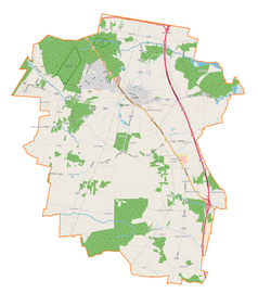 Mapa konturowa gminy Tuszyn, blisko centrum na dole znajduje się punkt z opisem „Szczukwin”