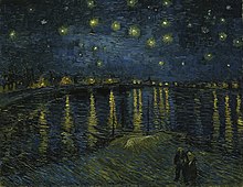 A view of a dark starry night with bright stars shining over the River Rhone. Across the river distant buildings with bright lights shining are reflected into the dark waters of the Rhone.