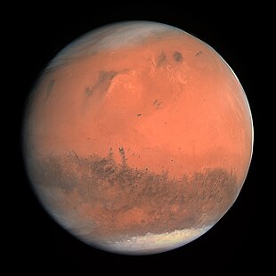 Mars in natürlichen Farben, aufgenommen mit dem OSIRIS-Instrument der Raumsonde Rosetta.