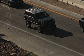 Lifted Black Jeep Cherokee on US-95 Exit from I-15.jpg