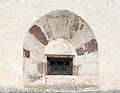 English: Barred window at the west wall Deutsch: Gitterfenster an der Westwand