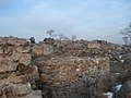 Stone walls and ancient water reservoir