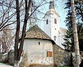 Turnul-clopotniță, bastionul semicircular și zidul de apărare