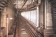 Reserved platform structure in the Line 6 eastbound tunnel, screen doors installed (September 2022)