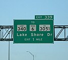 Guide sign: destination sign along Interstate 35 showing typical signage for a Farm to Market Road (right), along with signage for a State Highway Loop (left) and a State Highway (center) for comparison