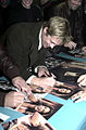 Brad Pitt signs autographs for troops at the Incirlik hospital Dec. 7. 2001