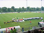 Le SAS (en jaune et noir) au Colmar Stadium en 2010.