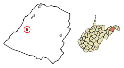 A white line map of Hampshire County with Romney’s location colored red