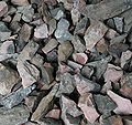 Rocks containing rhodonite