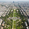 Image 6 Champ de Mars Photo credit: David Iliff Champ de Mars (Paris, France), as seen from the observation deck of the Eiffel Tower. In the distance is Tour Montparnasse and the dome on the left is Les Invalides. The École Militaire is at the end of the Champ de Mars. In English the name means "Field of Mars", from Mars the Roman god of war, from its original use for military training. During the French Revolution, the Champ de Mars was the setting of the Fête de la Fédération, on 14 July 1790. More selected pictures