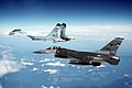 F-16A Block 15G from the 186th Fighter Squadron, Montana Air National Guard, escorts a Soviet Su-27