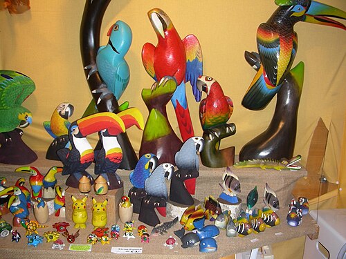 Blue and yellow wooden toys at display