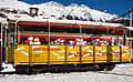 Offener Güterwagen der früheren Berninabahn, heute Aussichtswagen der Rhätischen Bahn