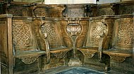 Choir stalls in the church of St. Pierre, Coutances, France, with the seats down