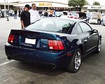 The rear of a 2004 Mystichrome Cobra coupe.