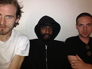 Death Grips у січні 2014 року. Зліва направо: Зак Хілл, MC Ride та Енді Морін.