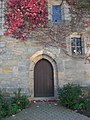 The left side entry of the Lutheran church