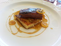 French toast and pork belly served with beer jam