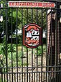 The coat of arms as shown on the entrance gate to Cripplegate Park