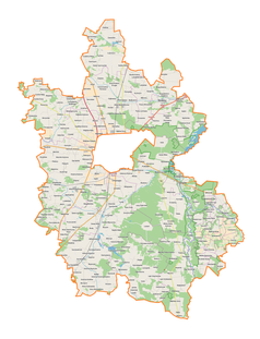 Mapa konturowa powiatu piotrkowskiego, blisko centrum na prawo u góry znajduje się punkt z opisem „Dębina”