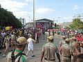 Torch relay in Coronel Fabriciano, Minas Gerais, with Don Lélis Lara (12 May).