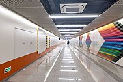 Exit B underpass passage with mural of 'Coloured Life'