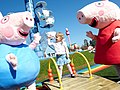 Peppa Pig and George in Peppa Pig World.