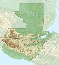 Mapa konturowa Gwatemali, na dole nieco na lewo znajduje się czarny trójkącik z opisem „Volcán de Agua”