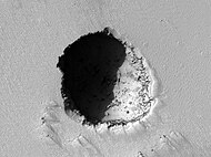 HiRISE image of a 180 m wide lava tube skylight on the volcano's southeast flank