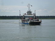 The Merv Hardie ferry in use before the bridge was opened.