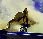 Santa singing at the 2024 Paralympics closing ceremony