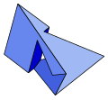 The Szilassi polyhedron.