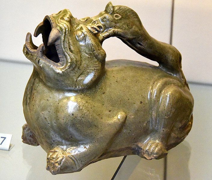 File:Urinal in the form of a tiger. Stoneware with olive green (celadon) glaze. Southern Dynasties, 500-589 CE. From China, Zhejiang. Victoria and Albert Museum.jpg