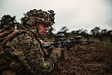 US Marine with OKC-3S attached to an M27 IAR in 2023. The USMC is one of only a few modern military forces to still teach bayonet fighting as part of basic training.