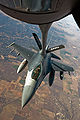 An F-16 Fighting Falcon receives fuel from a KC-135 Stratotanker