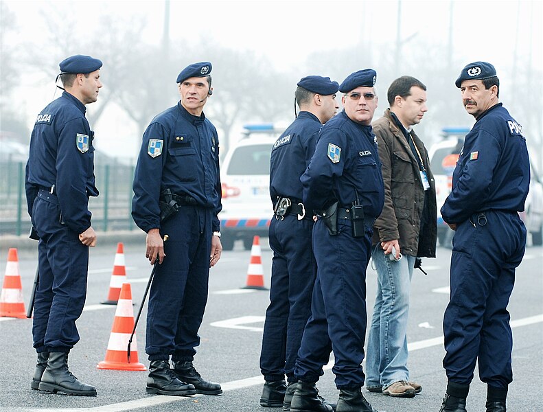 File:Police - Playing their role.jpg